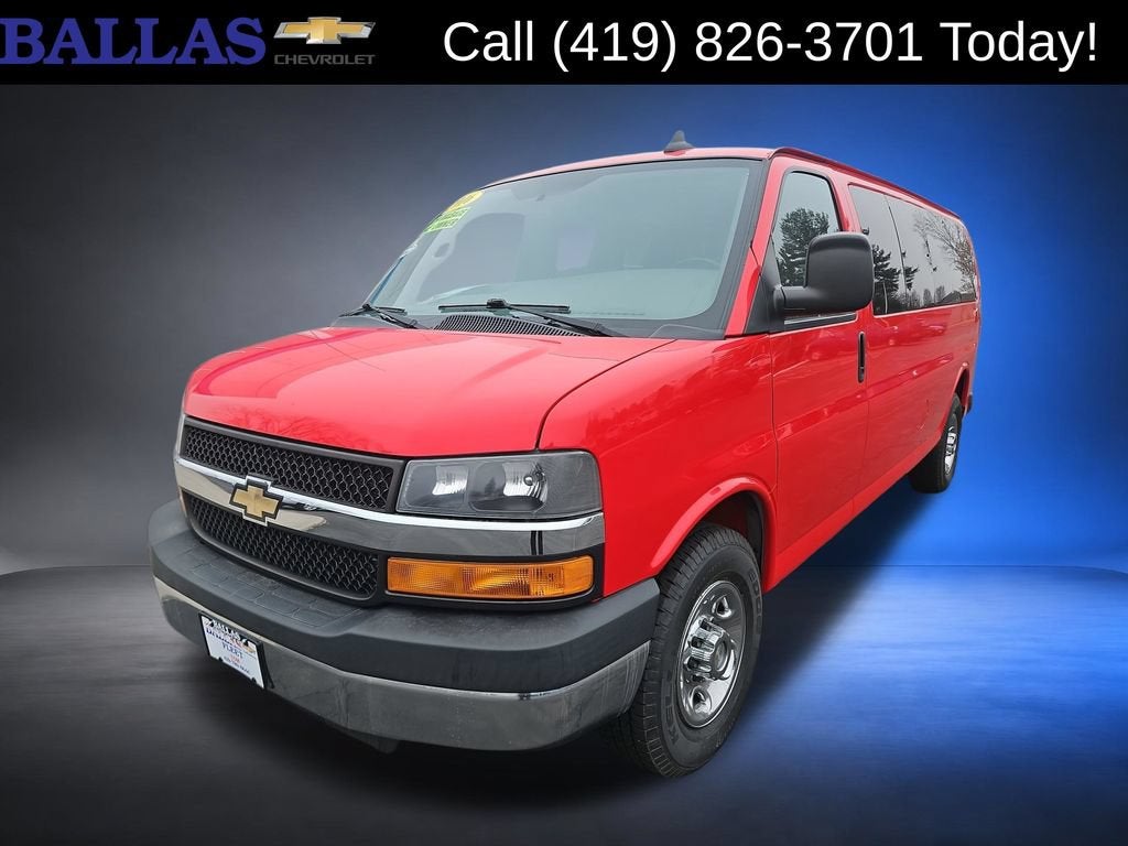 2016 Chevrolet Express Passenger 3500 LT in Red Hot — front three-quarter view